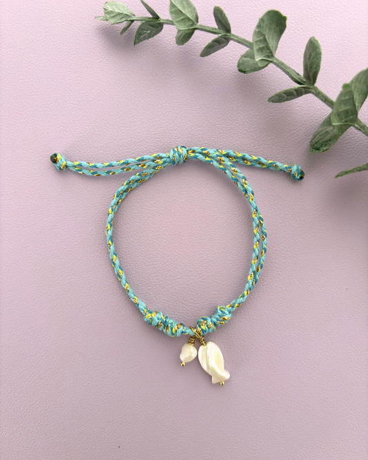 Pulsera Pez de Caracol y Perla de Agua Dulce- Hilo Azul Trenzado